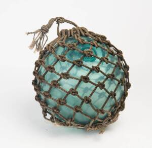 A glass fishing buoy (35cm diameter) and an old crab pot (64cm)