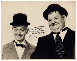 LAUREL AND HARDY, signed photograph. Together with theatre posters (9) from their c1953 shows in varied condition.