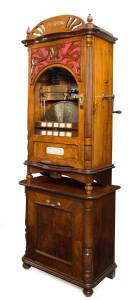 POLYPHON 5 auto changing 22" disc music box, penny coin operated with associated disc bin containing multiple titles. Restored and in fine working condition; auto changing polyphon of this caliber are extremely rare and desirable, the last example sold in