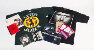 ENGLISH ROCK & ROLL: A collection of Australian Tour memorabilia including crew T-Shirts, promotional T-Shirts, Tour crew Itineraries, crew passes, guest passes, stickers, etc; some duplication: David Bowie, Paul Young, Elton John, Phil Collins, and a fra