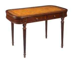 A George III style leather inset mahogany writing table, by Maitland-Smith, 20th century, 77cm high, 105cm wide, 60cm deep.