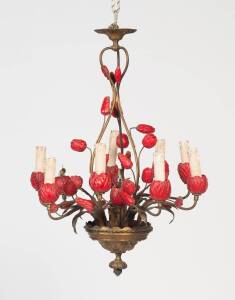 A wrought iron decorative tulip motif chandelier