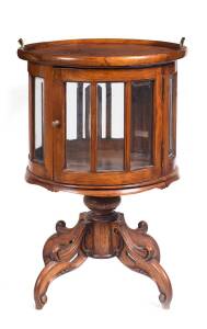 A Colonial Dutch/Indonesian&nbsp;circular cake cabinet with lift-off tray, teak, late 19th/early 20th Century. 90cm high, 57cm diameter&nbsp;