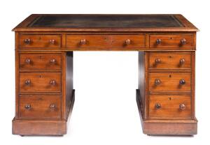 A Victorian mahogany twin pedestal desk with embossed green leather inset top, Circa 1820. Together with a Georgian mahogany carver chair, . Desk: 76cm high, 122cm wide, 70cm deep.