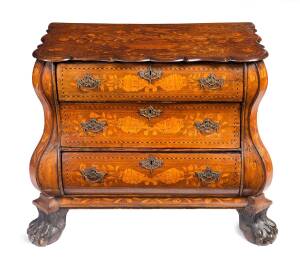 A Dutch 18th Century marquetry commode resting on claw feet. 77cm high, 87cm wide, 42cm deep. 