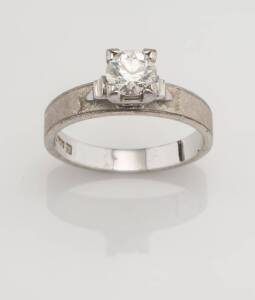 A solitaire diamond ring, four claw set with a transition cut diamond of estimated weight 1 carat. White gold. Weight 4.98 grams. Size R&nbsp;&frac12;.