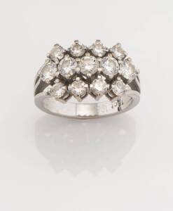 A diamond ring, set with three rows of brilliant cut diamonds, estimated total diamond weight 1.95 carats. 18ct white gold.&nbsp;Weight 6.21 grams. Size L&nbsp;&frac12;.&nbsp;