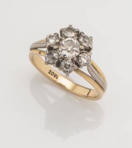 A diamond cluster ring, set with seven old cut diamonds, estimated total diamond weight 1.22 carats. 18ct yellow gold. Weight 4.98 grams. Size O.
