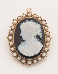 A Victorian cameo brooch, the oval cameo depicting the profile of a Classical female. 18ct yellow gold. Weight 17.98 grams. Length 42mm.