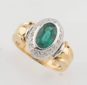 An emerald and diamond ring. 1.86 carats. Diamonds 0.17 carat. 18ct yellow and white gold. Weight 10.62 grams. Size Q.