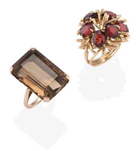 Two Cocktail rings, one a garnet cluster, the other set with a large rectangular smokey quartz. 9ct yellow gold. Weight 23.17 grams. Sizes L & Q.