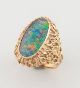 An opal triplet dress ring. 9ct gold. Weight 9 grams. Size P.