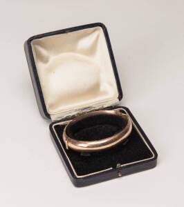 A Victorian bangle. 9ct rose gold filled.  Fitted box.