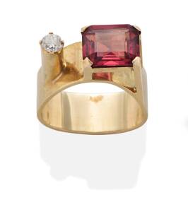 A tourmaline and diamond ring, circa 1970's. 9ct yellow gold. Weight 10 grams. Size N. 