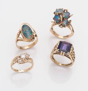 Six various dress rings including opal doublet and triplets, synthetic blue sapphire and diamond simulant. 9ct yellow gold. Weight 32 grams. Sizes L - N.