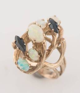Two white opal and sapphire rings. &nbsp;9ct yellow gold. Weight 16.94 grams. Sizes N and L &frac12;.&nbsp;