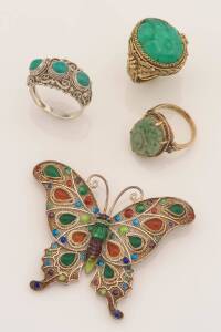 Three Chinese filigree and green stone &nbsp;rings and a multi-stone butterfly brooch. Silver and 9ct yellow gold.