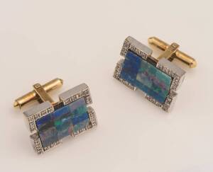 A pair of opal mosaic and diamond cufflinks. 14ct yellow and white gold. Weight 19.71 grams. Length 2.2cm.