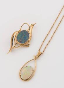 A crystal opal pendant on chain, and an opal doublet brooch.&nbsp;18ct yellow gold. Weight 16.04 grams.&nbsp;