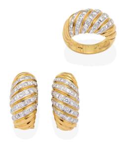 A gold and diamond suite, comprising ring and earrings. &nbsp;Post and clip attachments. 18ct yellow gold. Total weight 25.02 grams. Ring size L &frac12;