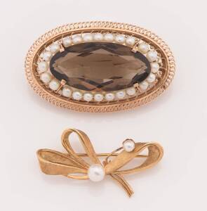 A smoky quartz and pearl pendant brooch. 14ct yellow gold. Weight 19.38 grams.To be sold with an 18ct yellow gold and pearl brooch. Weight 5.87 grams.