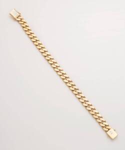 A curblink bracelet. 14ct yellow gold. Weight 21 grams. Length 18cm. Width 6mm.