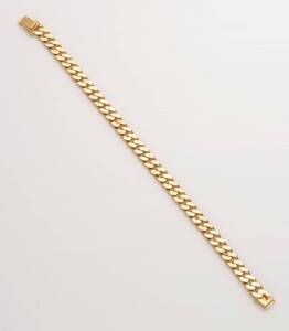 A curblink bracelet. 14ct yellow gold. Weight 56.85 grams. Length 23cm. Width 1cm.&nbsp;
