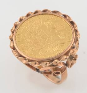 A gold coin ring, set with an Austrian 1 Ducat coin in a 14ct rose gold mount. Weight 7.25 grams.