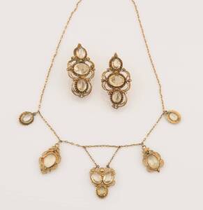 An antique French gold filigree and citrine suite, comprising earrings and modified necklace. Yellow gold. Weight 23 grams. (A/F)