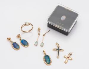 A collection of opal jewellery comprising opal doublet earrings and pendant, solid white opal ring and earrings, a loose black opal cabochon, and two crosses. 14ct and 9ct yellow gold. Weight 9.7 grams.