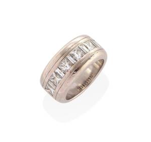 A diamond band ring, MDT Design, set with princess cut diamonds, total weight 1.62 carats and baguette diamonds,total weight 0.70 carat. 18ct white gold. Weight 19.13 grams. Size M.