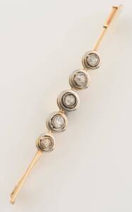 A five stone diamond bar brooch. 14ct yellow gold. Weight 4.08 grams. Length 6.5cm.