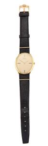 A Gentleman's gold dress watch, Chopard, circa 1920's. Manual. Reference 2031. 30mm oval case with matt gold dial and inlaid with four tiger eye batons at quarters. Case, dial, movement and clasp signed. Crocodile finish to black leather strap. 18ct yello