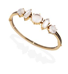 A Victorian style moonstone bangle, of hinged design. 18ct yellow gold. Weight 14.90 grams. Inside diameter 5.7cm.