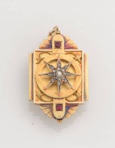A Victorian gold and diamond brooch, of architectural design, with central diamond set starburst flanked by garnet topped doublets. 18ct yellow gold. Weight 12.12 grams. Length 4cm.