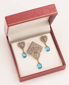 A rose cut diamond and blue topaz pendant and earrings. Earrings post and butterfly attachments. Yellow gold and silver. Length of pendant including drop 5.3cm.