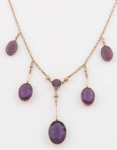 An amethyst pendant necklace. 9ct rose gold. With two additional, non-original paste drops.&nbsp;Weight 17.73 grams.&nbsp;