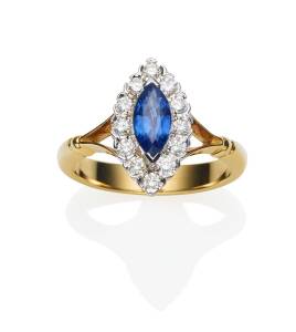 A sapphire and diamond ring, set with a marquise sapphire of known weight 0.85 carat and brilliant cut diamonds of known weight 0.36 carat. 18ct yellow gold. Weight 5.91 grams. Size N&nbsp;&frac12;.