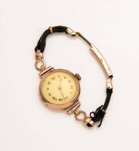 A Lady's gold Rolex wristwatch, circa 1920. 28mm. Manual. 9ct rose gold. (A/F enamel dial)