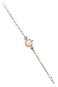 A Lady's wristwatch, Bulova. 14ct white gold. To be sold with a wristwatch, Ritex. 18ct yellow gold.