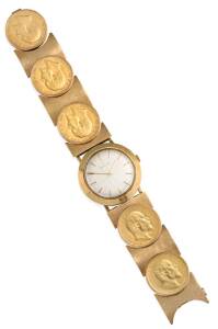 A Gentleman's gold wristwatch, Zenith, circa 1960. Manual. Cal. 2511; Movement number 5258532: Case number 143. 33mm circular case with cream textured dial. &nbsp;Applied gold baton numerals. Case, dial and 18 jewel movement signed. Snap back and front. Unusua
