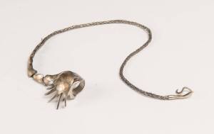 A Modern Australian silver, gold and titanium free form ring and bracelet chain by Ian Ferguson, Melbourne,&nbsp;circa1989