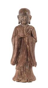 A Chinese iron cast lacquer figure of&nbsp;Ānanda, possibly Ming Dynasty (1368-1643), 49.5cm high; together with a Chinese wood carved lacquer figure of a Buddha, 36cm high