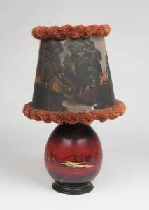 Australiana table lamp, hand painted ceramic base with revolving celluloid shade depicting a bushfire scene, circa 1920s. 46cm