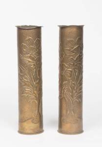A pair of floral embossed trench art brass shell case vases, English, Circa 1915