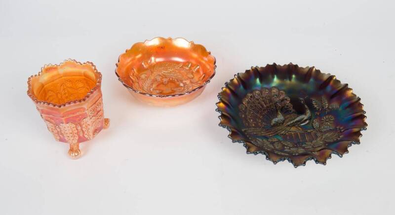 Carnival glass "Butterfly & Berries" pattern vase (11.5cm), "Acorn" pattern bowl (16cm diameter), plus cobalt carnival glass peacock bowl (22cm diameter). 