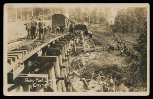 1925 Murray (Gympie) real photo "Rocky Mail Disaster", a terrific photo showing damage to the railway line on the trestle bridge, wreckage of several carriages in the ravine, plus an array of workers, gawkers & a lone policeman, a few minor spots on the r