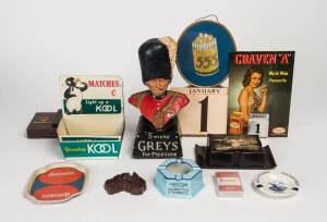 TOBACCIANA, noted counter-top display advertising (4); trays (5); cigarette cases (2); calendars (2); ash-trays (14); playing cards (2 packs); calculator; paper-weight; lighter fluid.