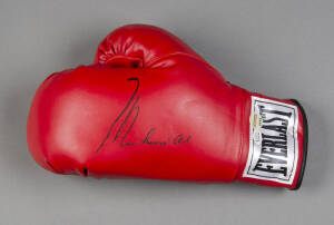 MUHAMMAD ALI, signature on 'Everlast' boxing glove. With 'Online Authentics' No.OA-7847324.