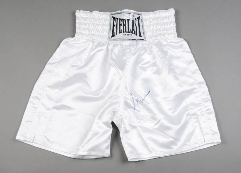 MUHAMMAD ALI, signature on pair of "Everlast" boxing shorts. With 'Online Authentics' No.OA-8090187.